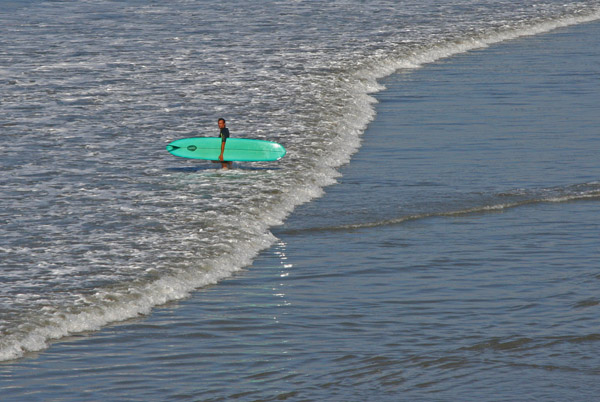surfer green board