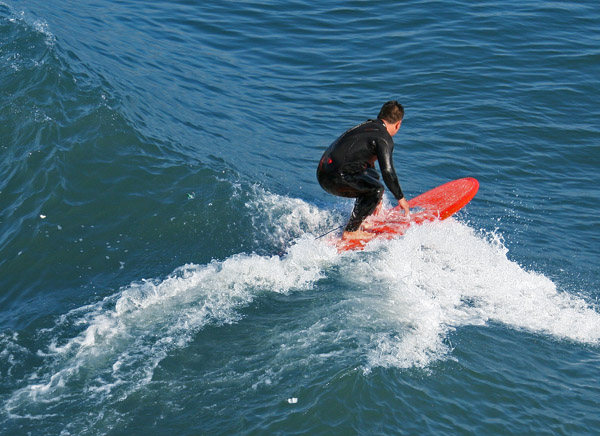 surfer on the crest