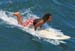 surfer catching a wave